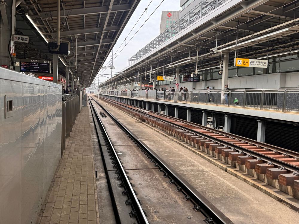 Yellow safety line along the edge of a train platform