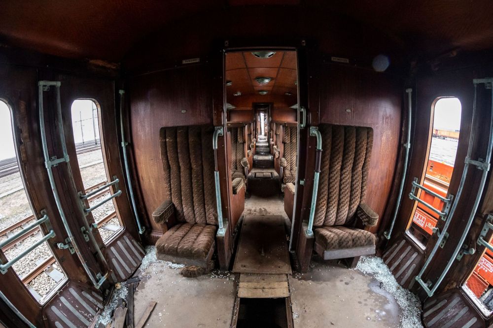 Jurong Region Line: How Tough Terrain Shaped the Build 4 Passengers sitting and standing inside a modern metro train carriage during the day